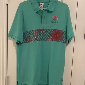 Nike Men's Green Polo with Floral and Checkered Design